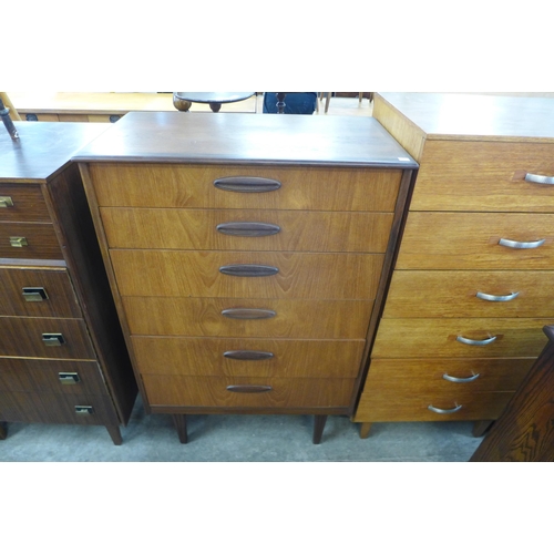 141 - A teak chest of drawers