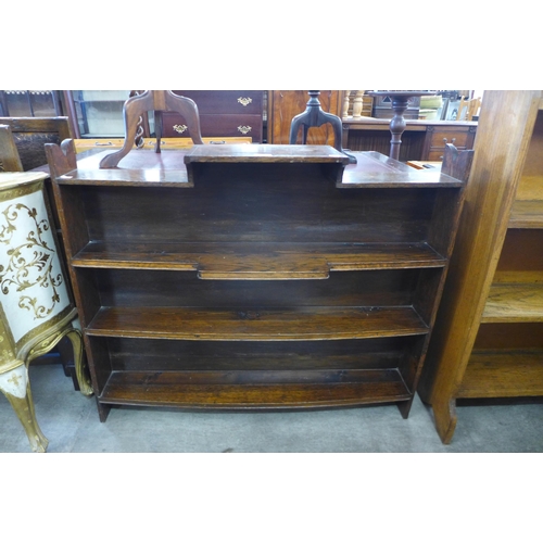 153 - An early 20th Century oak open bookcase