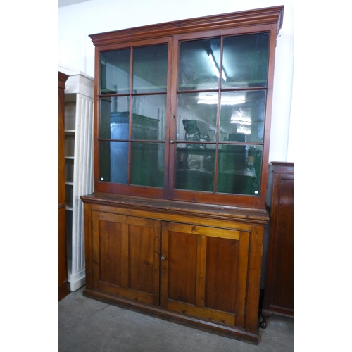 166 - A large Victorian pine country house gun cabinet