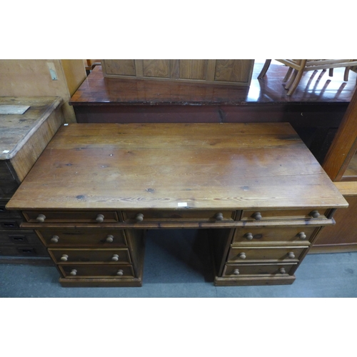 169 - A pine pedestal desk