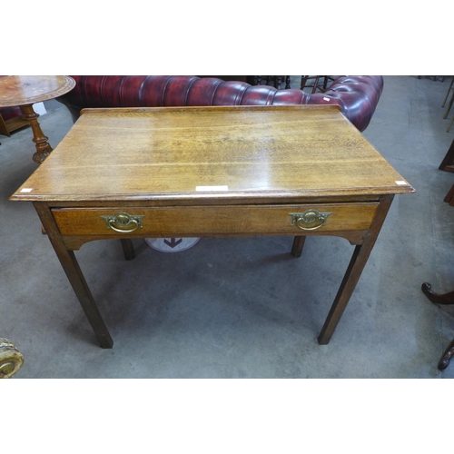 2 - A George II oak single drawer side table