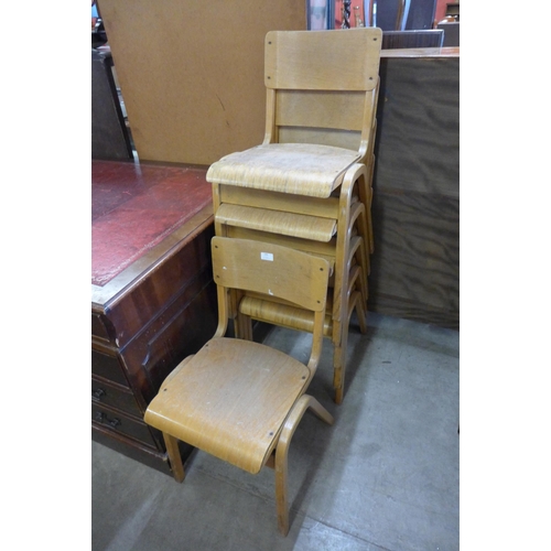 245 - A set of six beech and plywood stacking chairs