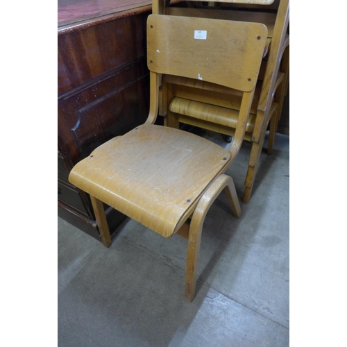 245 - A set of six beech and plywood stacking chairs