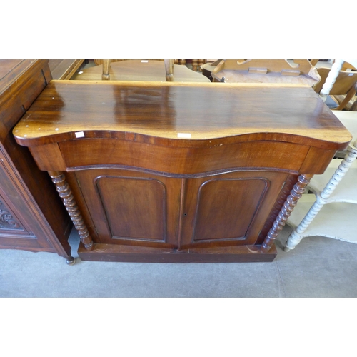 254 - A Victorian mahogany serpentine chiffonier