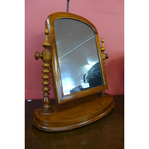 27 - A Victorian mahogany toilet mirror