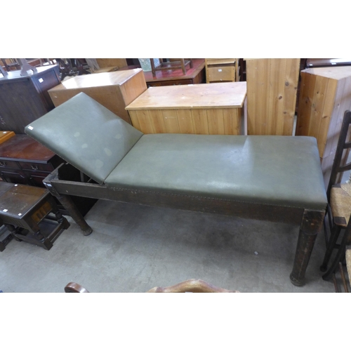 289 - A 1930's oak and upholstered medical inspection bench