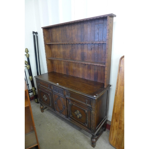 293 - A carved oak dresser a/f