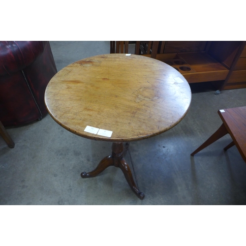 3 - A George III oak and mahogany circular tilt top tripod table