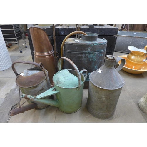 328 - Three galvanised watering cans, a copper sprayer and a coal bucket