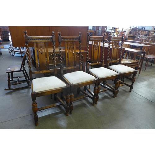 62 - A set of four carved oak barleytwist dining chairs