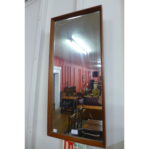 77 - A teak framed mirror