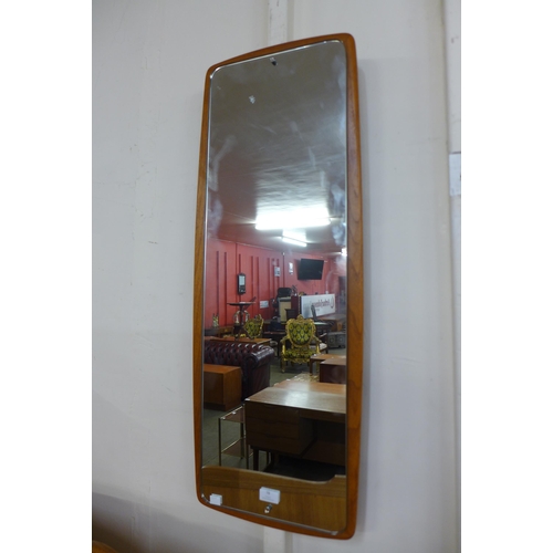 78 - A teak framed mirror