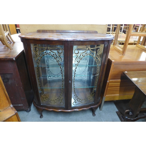 182 - A walnut display cabinet