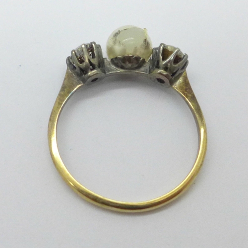 1002 - A 9ct gold and silver ring, N