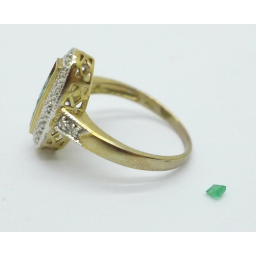 1005 - A 9ct gold, emerald and diamond ring, 3.1g, O, one emerald loose