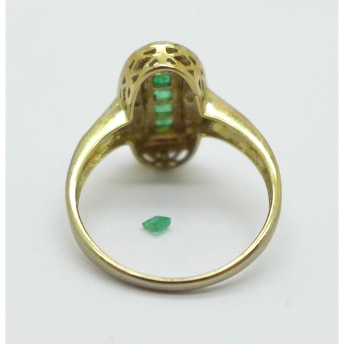 1005 - A 9ct gold, emerald and diamond ring, 3.1g, O, one emerald loose