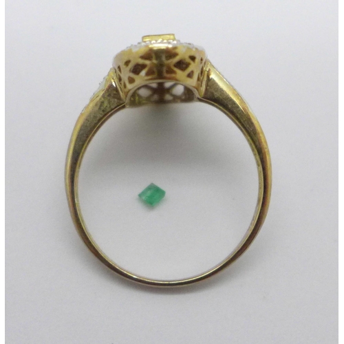 1005 - A 9ct gold, emerald and diamond ring, 3.1g, O, one emerald loose