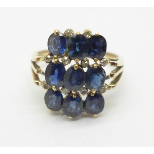 1011 - A yellow metal sapphire and diamond dress ring, marked 18K, 4.8g, R