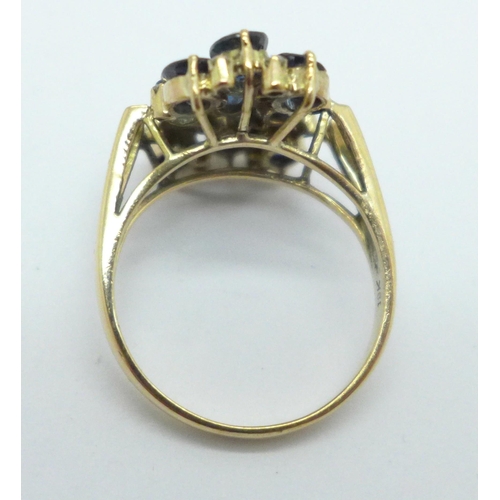 1011 - A yellow metal sapphire and diamond dress ring, marked 18K, 4.8g, R