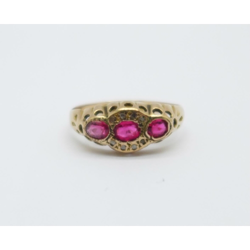 1019 - A 9ct gold ring set with diamonds and pink stones, Chester 1916, 1.4g, O