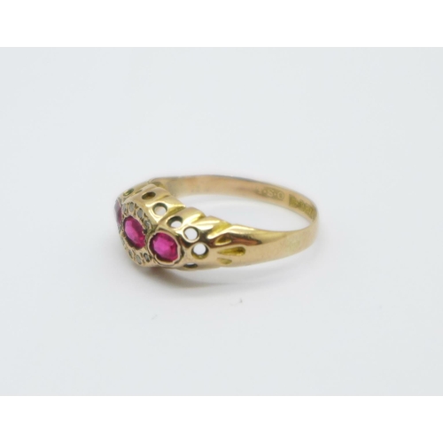 1019 - A 9ct gold ring set with diamonds and pink stones, Chester 1916, 1.4g, O