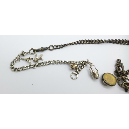 1020 - A silver Albert and a silver charm bracelet, 70g, and one other chain with seal fob