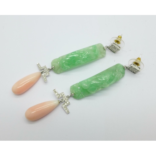 1021 - A pair of jade, coral and diamond pendant earrings, 75mm drop