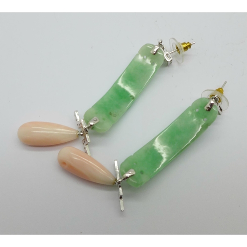 1021 - A pair of jade, coral and diamond pendant earrings, 75mm drop