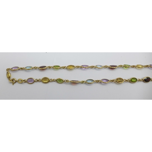 1027 - A 9ct gold and gem set necklace, 15.7g, 58cm