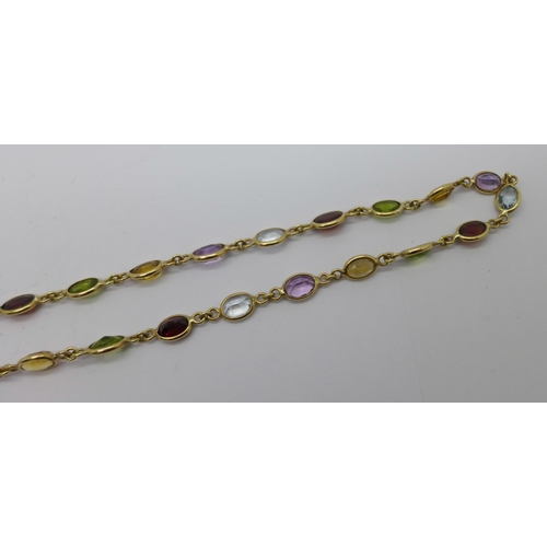 1027 - A 9ct gold and gem set necklace, 15.7g, 58cm