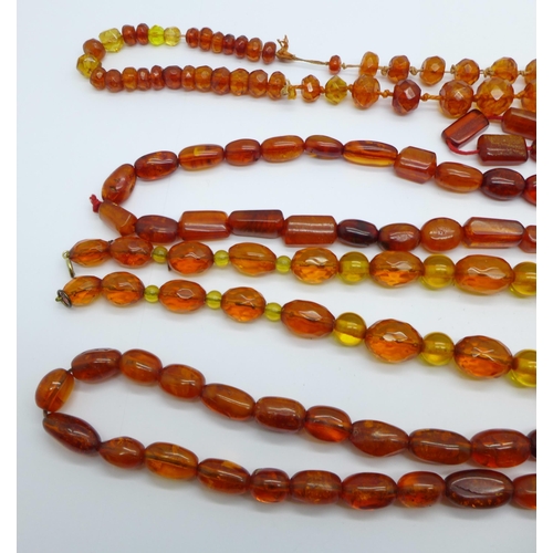 1034 - Four amber necklaces