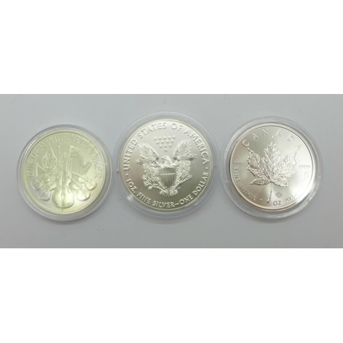 1052 - A 1oz Liberty 999 silver coin, a 1oz Maple 999 silver coin and an Austrian Philharmoniker 999 silver... 