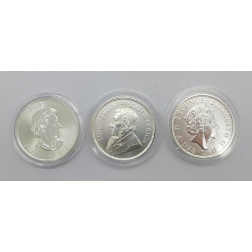 1053 - A 1oz Britannia 999 silver coin, a 1oz Krugerrand 999 silver coin and a 1oz maple 999 silver coin, (... 