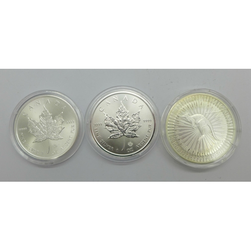 1054 - Two 1oz 999 silver Maple coins and a 1oz 999 silver Australian kangaroo coin, (3)