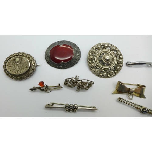 1066 - Nine brooches, including three marked silver and one RAF