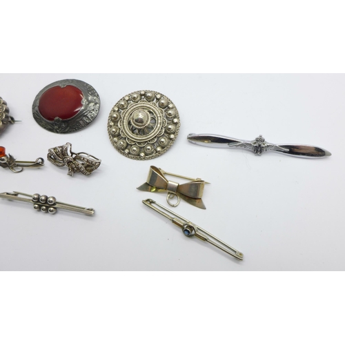 1066 - Nine brooches, including three marked silver and one RAF