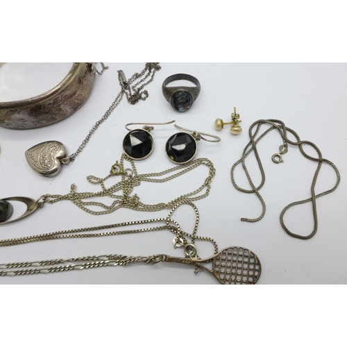 1068 - Silver jewellery including a bangle, pendants, a ring, etc.