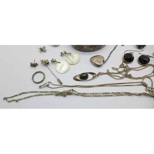 1068 - Silver jewellery including a bangle, pendants, a ring, etc.