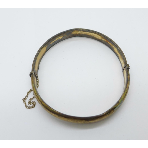 1073 - A 9ct gold bangle, a/f, 10.6g