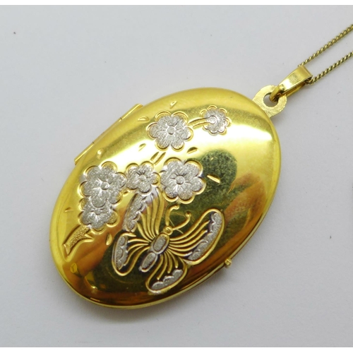 1075 - A 9ct gold locket and chain, 5.6g