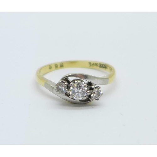 1081 - An 18ct gold, platinum set three stone diamond ring, 2.8g, N, centre stone approximately 0.25 carat