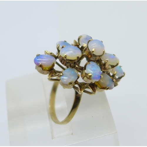 1090 - A 14ct gold and opal cluster ring, 4.2g, L