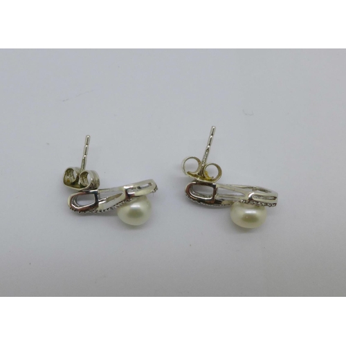 1120 - A pair of silver, diamond and pearl earrings