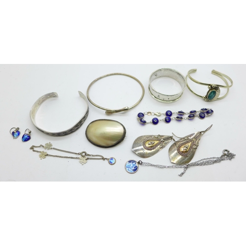 1133 - Silver and white metal jewellery and a silver napkin ring