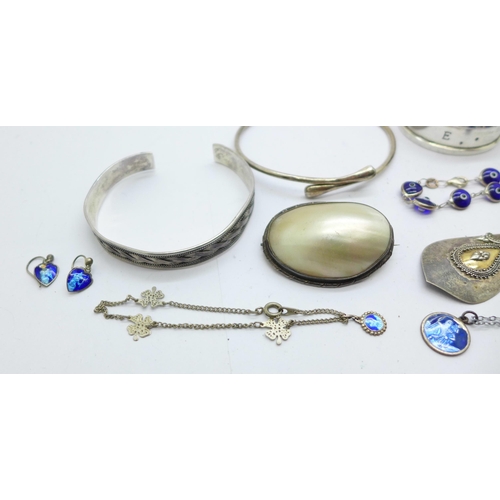 1133 - Silver and white metal jewellery and a silver napkin ring