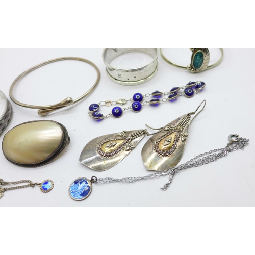 1133 - Silver and white metal jewellery and a silver napkin ring