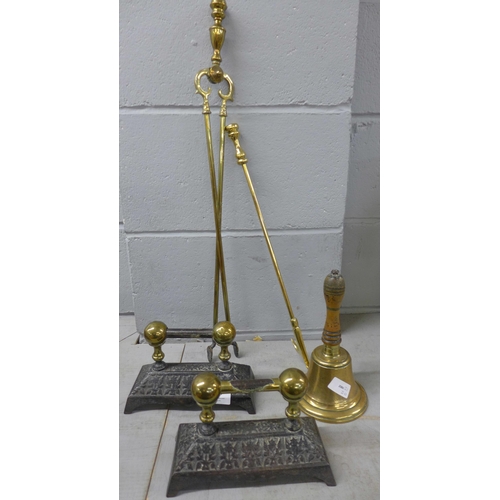 1174 - A brass bell, two fire irons and a pair of fire irons **PLEASE NOTE THIS LOT IS NOT ELIGIBLE FOR POS... 