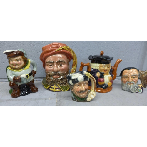 1188 - Two small Royal Doulton character jugs, two other character jugs and a novelty teapot **PLEASE NOTE ... 