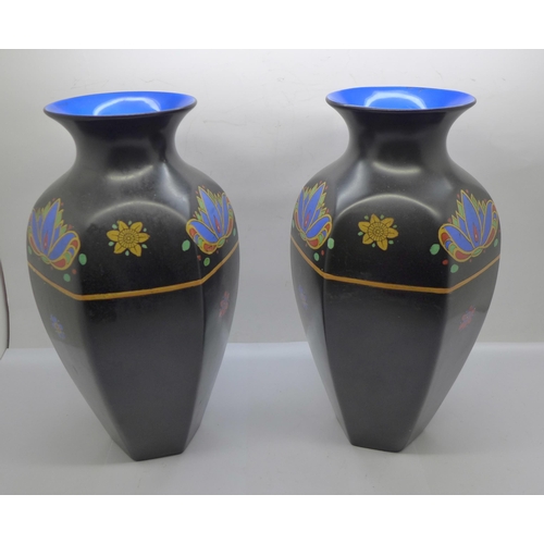 609 - A pair of Crown Ducal vases, 23.5cm