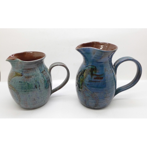 610 - Two studio pottery jugs, signed, L. Stockley, Weymouth